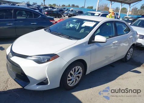 2017 Toyota Corolla Le z USA, uszkodzony, nr VIN 5YFBURHE5HP703323